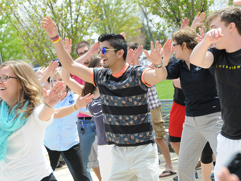 students dancing together in the penn state lehigh valley courtyard